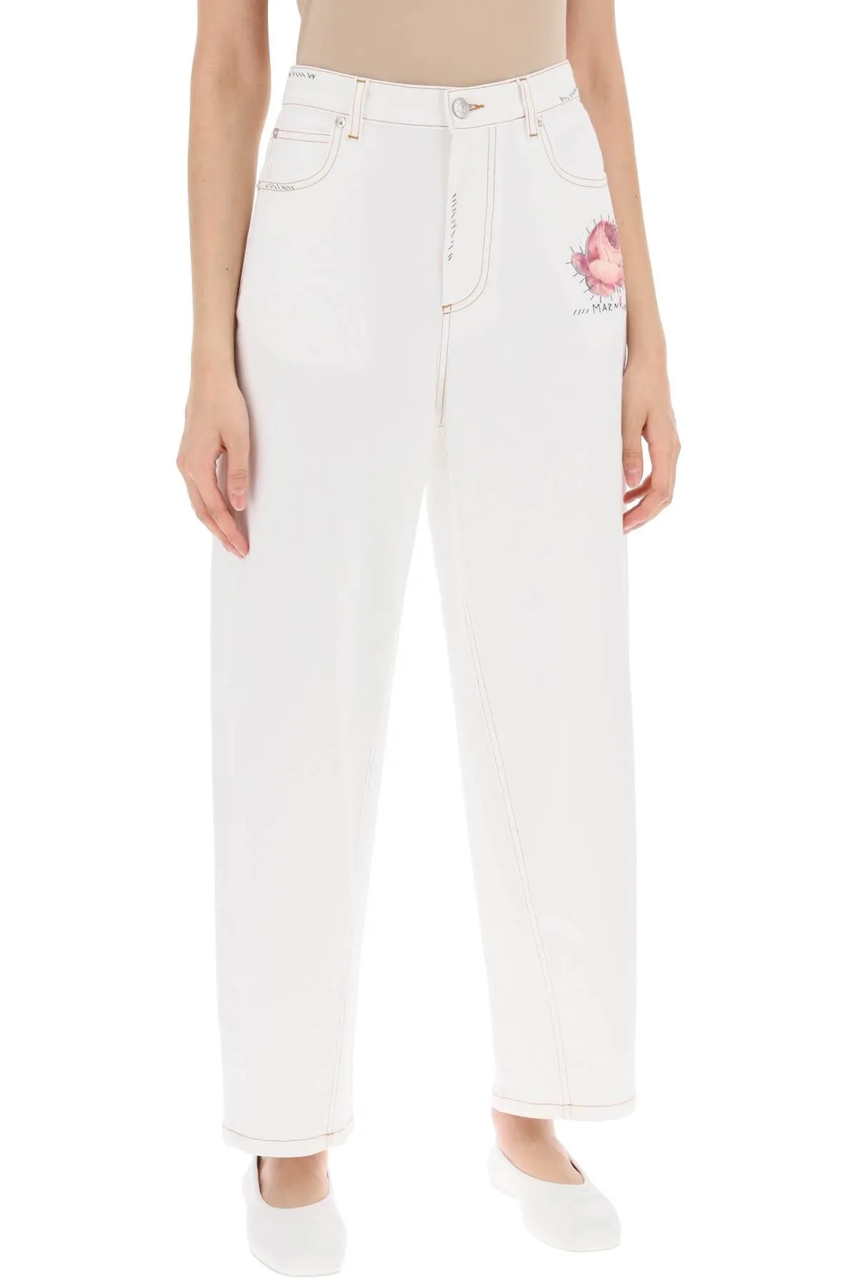 "jeans with embroidered logo and flower patch