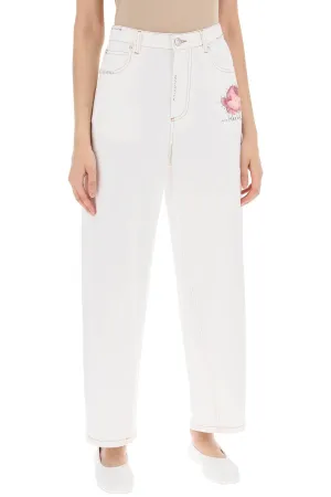 "jeans with embroidered logo and flower patch
